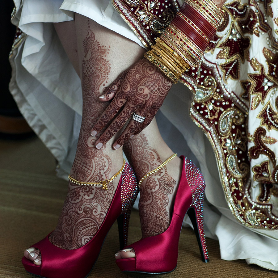 “Bridal foot mehndi with traditional Indian patterns”